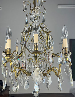 Antique Circa 1920 French Cast Brass and Crystal Eight Light Chandelier