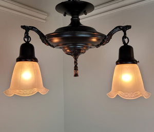 Antique Circa 1920 Two Light, Edwardian Flush Mount Pan Fixture with Cast Ovid Scroll Arms and Antique Nuart Shades
