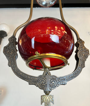 Antique Circa late 1870s early 1880s Renaissance Revival Converted Gas Hoop with Antique 5" Cranberry Fishbowl Shade and Matching Smoke Bell