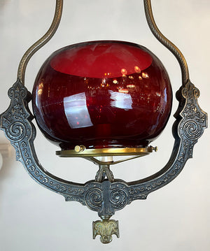 Antique Circa late 1870s early 1880s Renaissance Revival Converted Gas Hoop with Antique 5" Cranberry Fishbowl Shade and Matching Smoke Bell