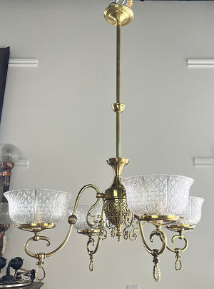 Antique Circa 1890 Late Victorian Converted Gas Four Light with Cast Neo Classical Center Body Scroll Arms and Signed Gillender Shades