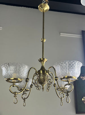 Antique Circa 1890 Late Victorian Converted Gas Four Light with Cast Neo Classical Center Body Scroll Arms and Signed Gillender Shades