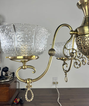 Antique Circa 1890 Late Victorian Converted Gas Four Light with Cast Neo Classical Center Body Scroll Arms and Signed Gillender Shades