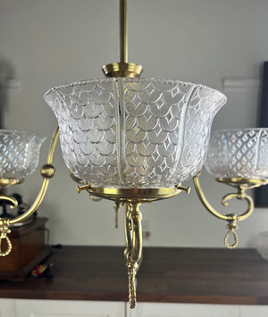 Antique Circa 1890 Late Victorian Converted Gas Four Light with Cast Neo Classical Center Body Scroll Arms and Signed Gillender Shades