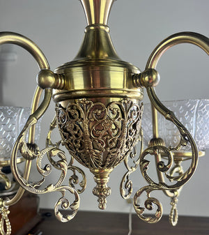 Antique Circa 1890 Late Victorian Converted Gas Four Light with Cast Neo Classical Center Body Scroll Arms and Signed Gillender Shades
