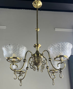 Antique Circa 1890 Late Victorian Converted Gas Four Light with Cast Neo Classical Center Body Scroll Arms and Signed Gillender Shades
