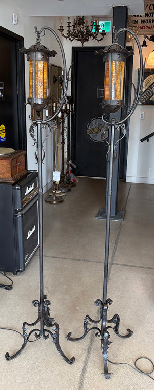 $3000 PAIR - Incredible pair of early 1900s Arts and Crafts Wrought Iron Lantern Floor Lamps with Amber Glass Cylinder Shades