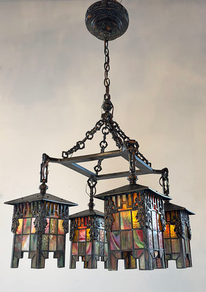 Antique Circa 1905-1910 Arts and Crafts Four Light Chain Suspended Chandelier with Leaded Glass Lantern Shades and Original Japanned Copper Verdegris Finish