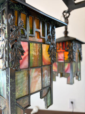 Antique Circa 1905-1910 Arts and Crafts Four Light Chain Suspended Chandelier with Leaded Glass Lantern Shades and Original Japanned Copper Verdegris Finish
