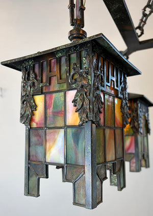 Antique Circa 1905-1910 Arts and Crafts Four Light Chain Suspended Chandelier with Leaded Glass Lantern Shades and Original Japanned Copper Verdegris Finish