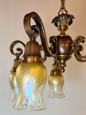 Elegant Antique Circa 1910 Edwardian Scroll Arm Five Light Chandelier with Signed Lundberg Art Glass Pulled Feather Shades