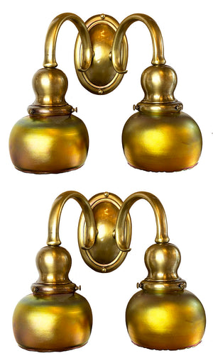 $1950 PAIR -Stunning Pair of Circa 1905-10 Cast Brass Double Light Sconces Attributed to Bradley and Hubbard with a Matching Set of Gold Aurene Steuben Shades
