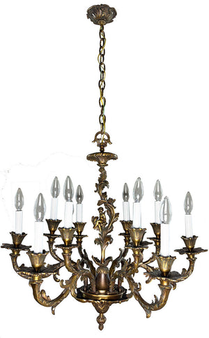 Antique Circa 1920 Ten Light European Bronze Rococo Revival Chandelier with Cast Figural Cherub