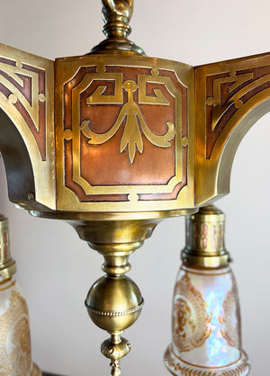 Exceptional early 1900s Four Light Transitional Fixture with Brass on Copper Overlay and Antique Copper Flashed Cameo Shades