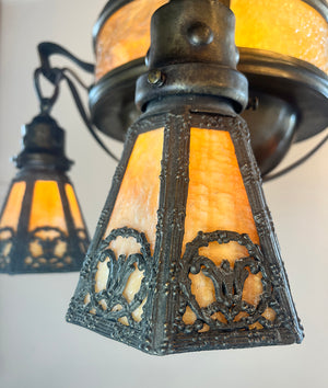 Antique Circa 1910 Arts and Crafts Four Light Chain Suspended Fixture with Butterscotch Slag Glass Center Body and Shades