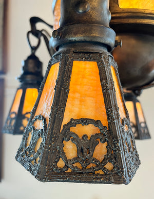 Antique Circa 1910 Arts and Crafts Four Light Chain Suspended Fixture with Butterscotch Slag Glass Center Body and Shades
