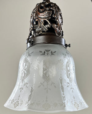 Antique Circa 1915 Embossed and Cast Arm Pan Light with Decorative Filigree Shade Holders and Original Stencil Etched Shades