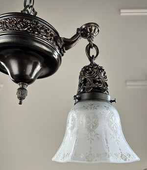 Antique Circa 1915 Embossed and Cast Arm Pan Light with Decorative Filigree Shade Holders and Original Stencil Etched Shades