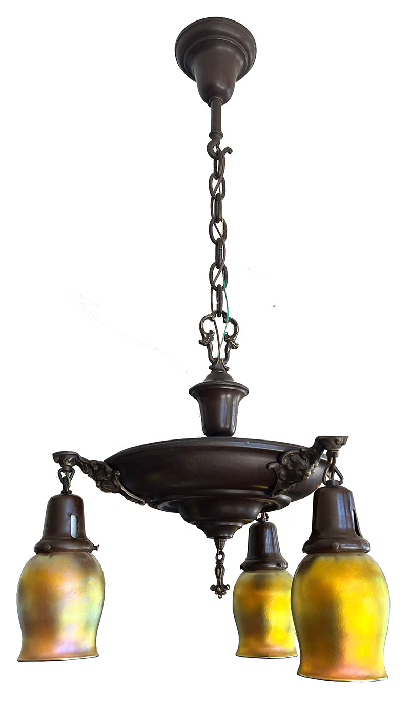 Antique Circa 1915 Three Light Cast Arm Pan Fixture with a Signed Set of Steuben Gold Aurene Shades
