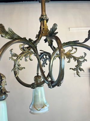 Antique Early 1900s Transitional Art Nouveau Three Arm Exaggerated Scroll Arm Flush Mount with Orate Filigree and Original Pulled Feather Art Glass Shades