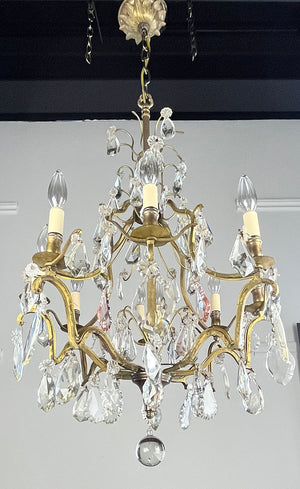 Antique Circa 1920 French Cast Brass and Crystal Eight Light Chandelier