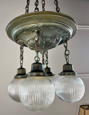 Antique Circa 1905 Four Light Embossed Beaux Arts Cascade with Ribbed Holophane Shades