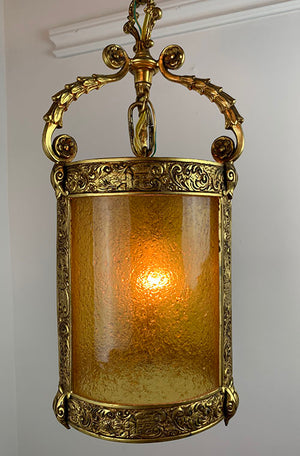 Antique Circa 1910-20s Era Tudor Revival Lantern with Original Antiqued Gold Finish and Crackle Amber Glass Cylinder