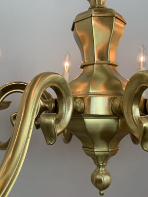 Antique Circa 1930 Eight Light Cast Scroll Arm Brass Chandelier with Octagonal Center Body