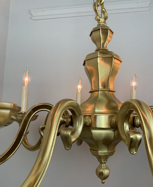 Antique Circa 1930 Eight Light Cast Scroll Arm Brass Chandelier with Octagonal Center Body