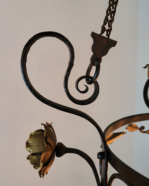 Antique Circa 1905 Single Light, Wrought Iron Lantern Fixture with Organic Leaf Details and an Antique Opalescent Swirl Shade.