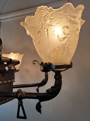 Antique Circa 1890, Spectacular Eight Light, R Williamson & Co. of Chicago Converted Gas Electric Chandelier with Eight Sided Center Body and Antique Lion Pressed Glass Stencil Etched Shades