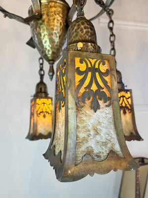 Antique Circa 1905-10 Four Light Hammered Arts and Crafts Cascade with Restored Original Finish and Original Four Sided Slag Glass Bell Shades