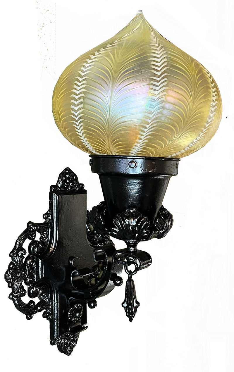 Antique early 1900s Beaux Arts Wrought and Cast Iron Exterior Wall Sconce with Handblown Lundberg Studios Glass Shade