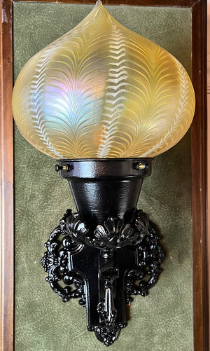 Antique early 1900s Beaux Arts Wrought and Cast Iron Exterior Wall Sconce with Handblown Lundberg Studios Glass Shade