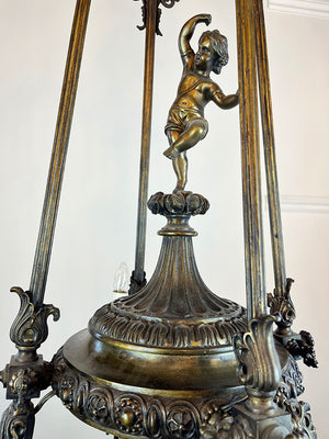 Ornate Antique 1890s Rod Suspended French Bronze Converted Gasolier with Cast Cherub