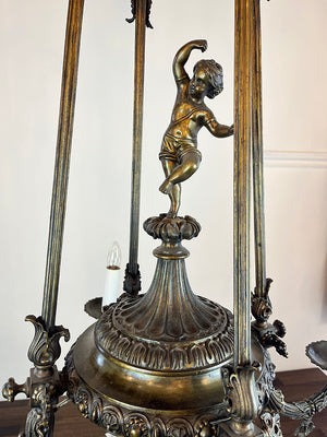 Ornate Antique 1890s Rod Suspended French Bronze Converted Gasolier with Cast Cherub
