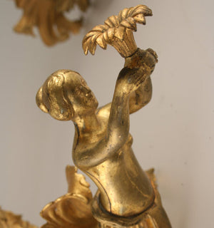 figural gas wall sconce